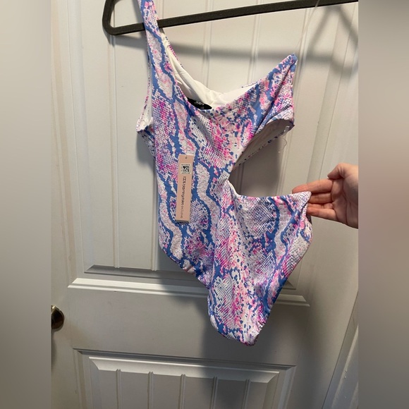 Aqua 
Women’s one piece 
Size small 
NWT - Picture 2 of 4